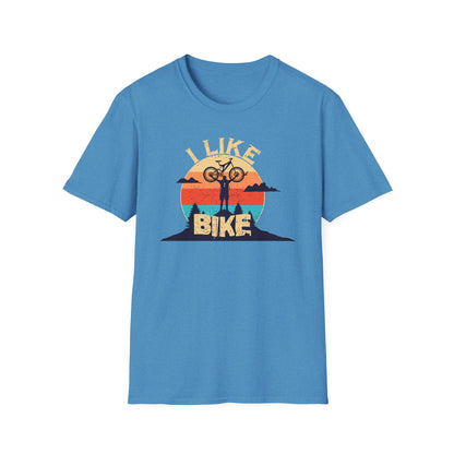 I like bike graphic t-shirt depicting a person holding a bike over their head on top of a hill with a retro sun in the background, shirt color light blue.