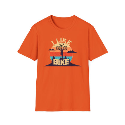 I like bike graphic t-shirt depicting a person holding a bike over their head on top of a hill with a retro sun in the background, shirt color orange.